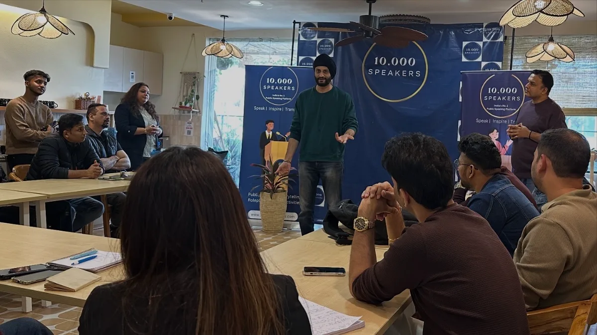 A participant gives a talk to the room at a 10,000 Speakers class in Gurgaon